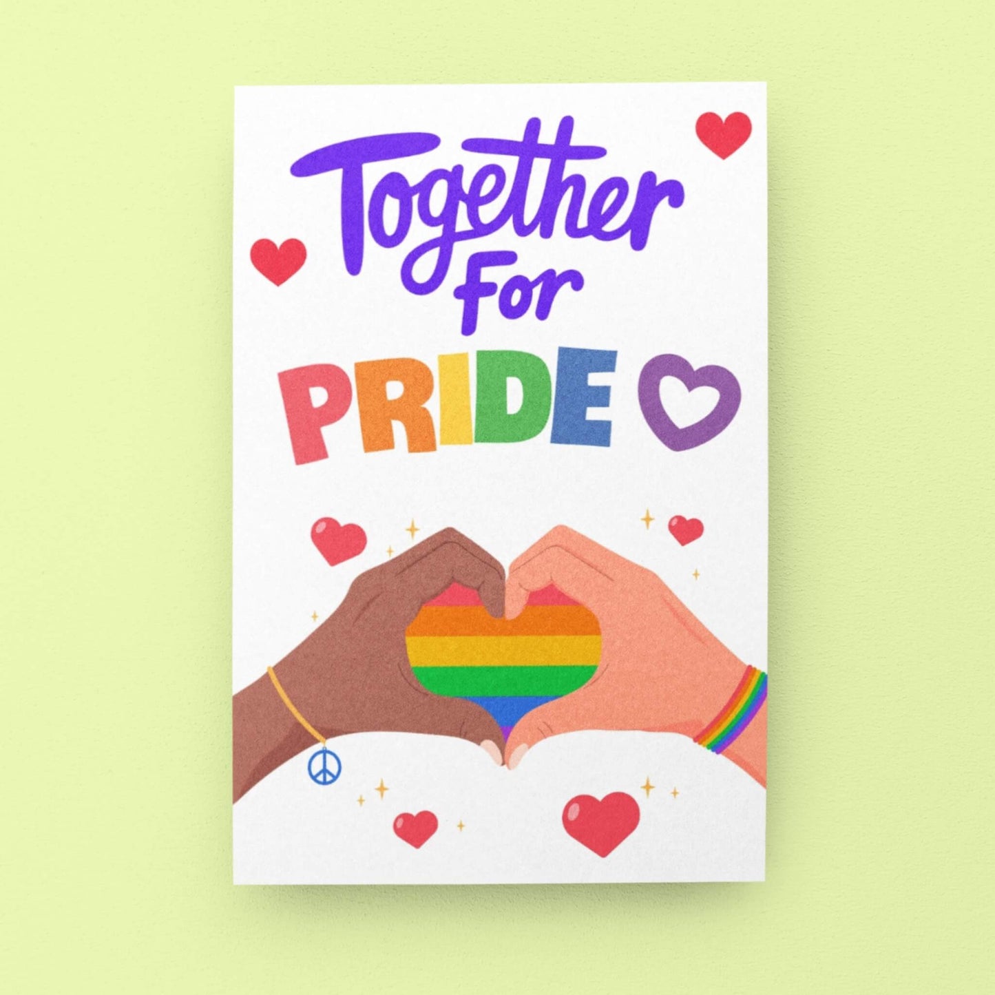 LGBTQ+ Pride celebration card with bold rainbow-colored text reading “Together for Pride.” Features a rainbow heart formed by two hands in a heart shape. A card to celebrate Pride and support the LGBTQ+ community.