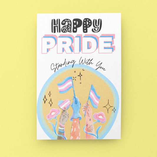 A card, with big bold font saying 'Happy Pride' in Transgender flag colours and a large Transgender flag in the centre of the card. Designed to support transgender people during Pride and show allyship. 