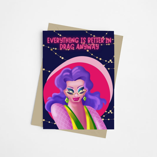 A card, with a dark blue background and fairy lights featuring a drag queen dressed in bright colours in a sassy pose. Designed to support and celebrate drag artists. 