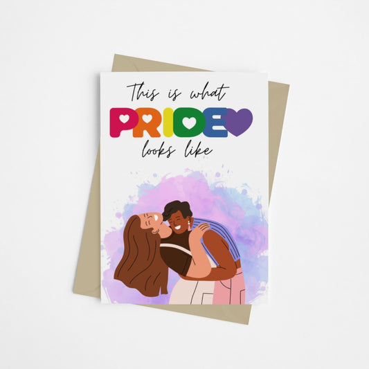 A card, with a mixture of white and water colour background and a queer couple on the front celebrating pride. Designed to celebration LGBTQ+ pride 2025.