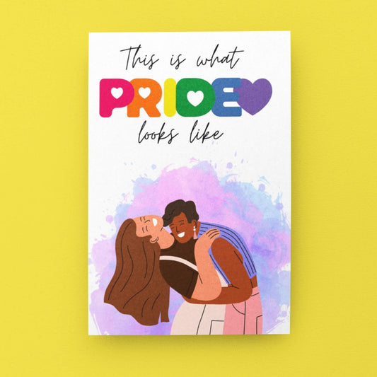 A card, with a mixture of white and water colour background and a queer couple on the front celebrating pride. Designed to celebration LGBTQ+ pride 2025.