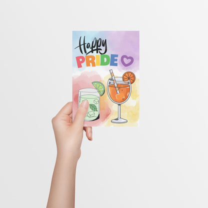 Colorful LGBTQ+ Pride card with two cocktails on the front and bold text reading “Happy Pride.” A cheerful and supportive card to celebrate Pride Month and LGBTQ+ identity.